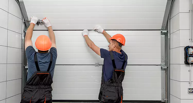 Garage Door Bottom Panel Repair in Fort Pierce, FL